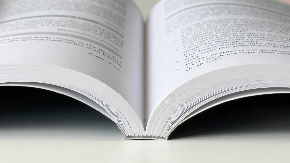 PUR bound book lying open flat